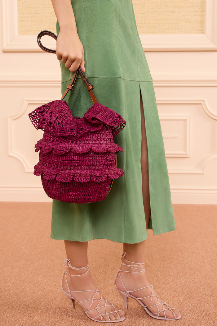 Orchid Premium Raffia Bucket Bag Hand-Carried with Green Suede Dress - Styled Look | Ulla Johnson