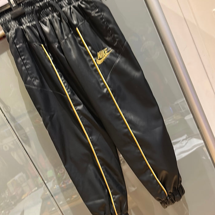Pantalon nike or et noir enfant