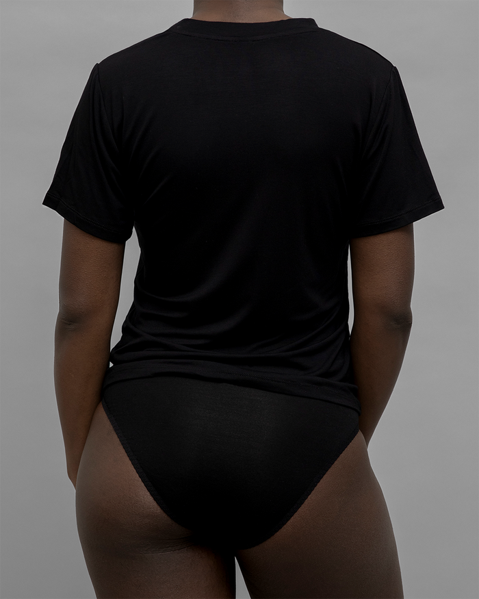 Back View of the Recline Tee in Black from KYE Intimates in Los Angeles.
