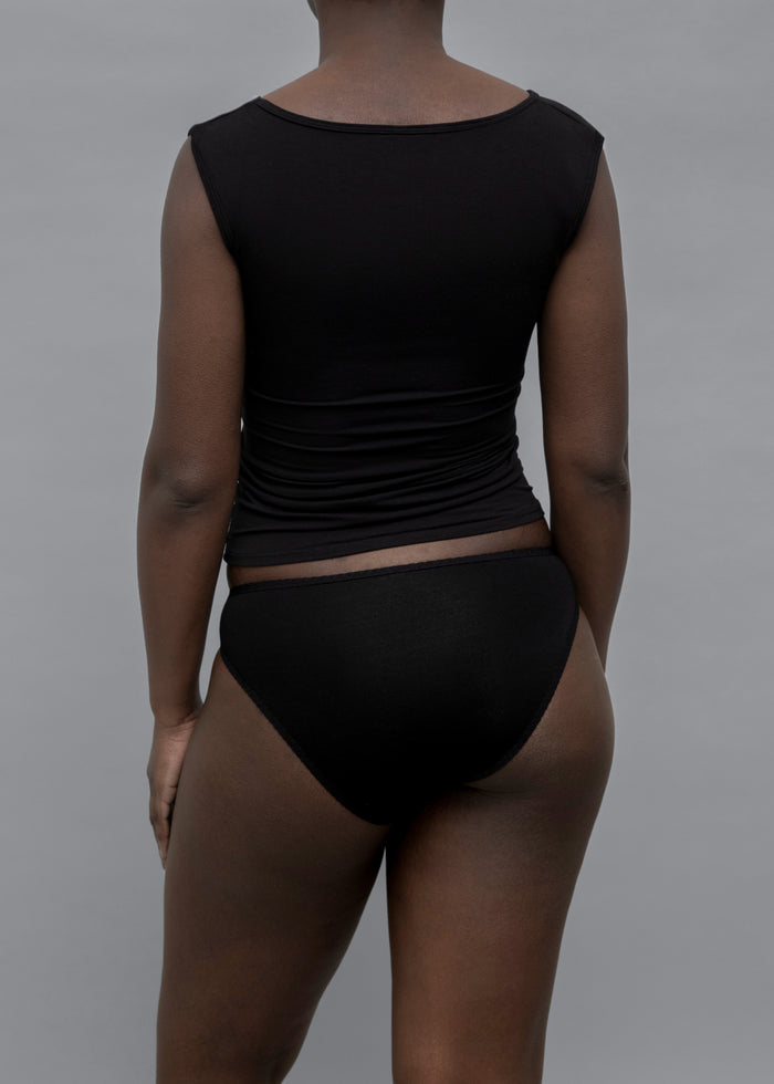 Side View of the Recline Shell in Black from KYE Intimates in Los Angeles.
