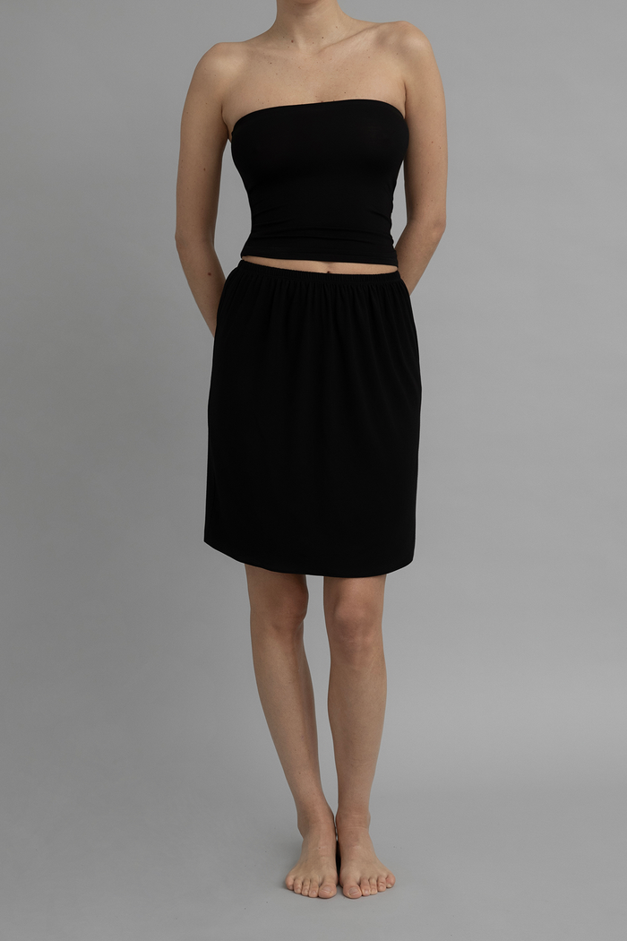 Front View of Recline Skirt in Black from KYE Intimates in Los Angeles.