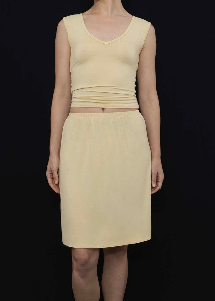 Front View of KYE Intimates Recline Skirt in Limoncello.