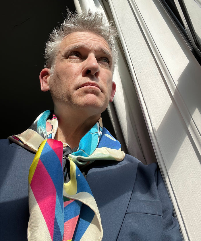 Stephen Bliss wearing his echo100 scarf design