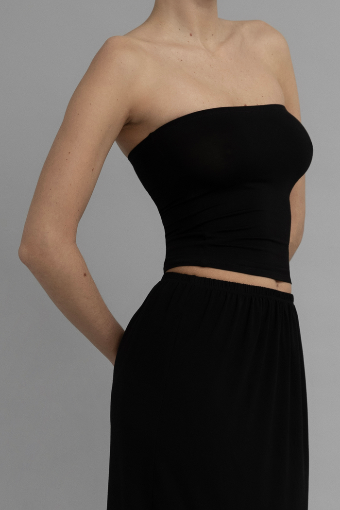 Side View of Recline Strapless Top in Black from KYE Intimates in Los Angeles.