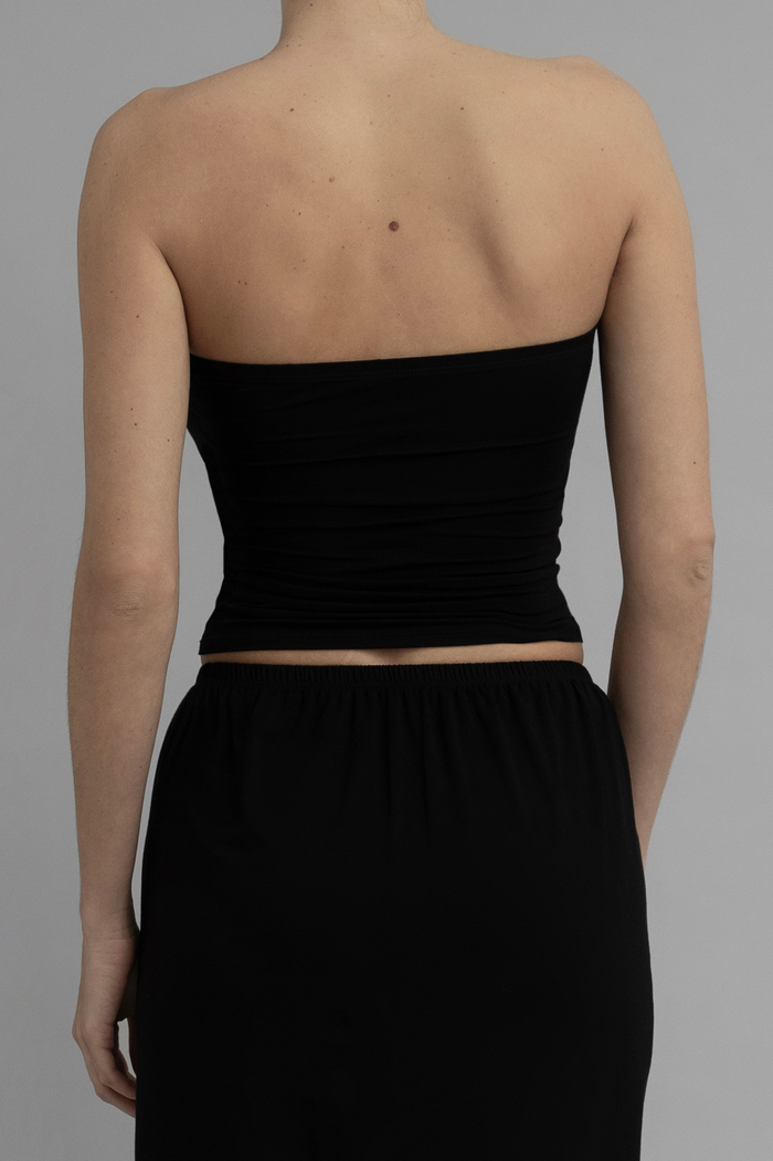 Back View of Recline Strapless Top in Black from KYE Intimates in Los Angeles.
