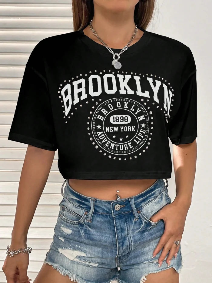 SXV Brooklyn Letter Graphic Drop Shoulder Tee Graphic Tees Women Tops
