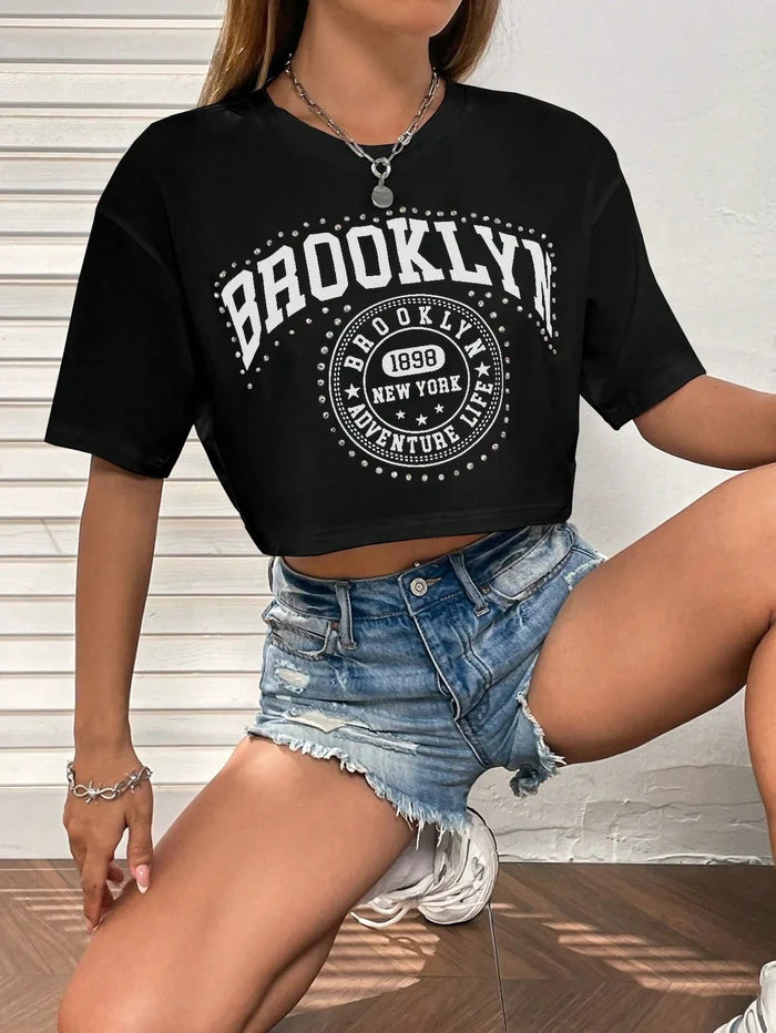 SXV Brooklyn Letter Graphic Drop Shoulder Tee Graphic Tees Women Tops