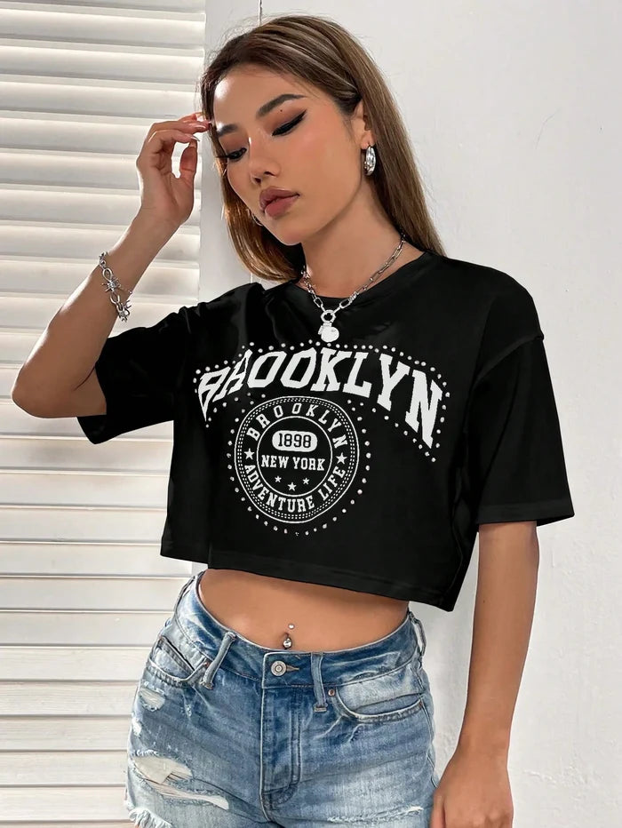 SXV Brooklyn Letter Graphic Drop Shoulder Tee Graphic Tees Women Tops
