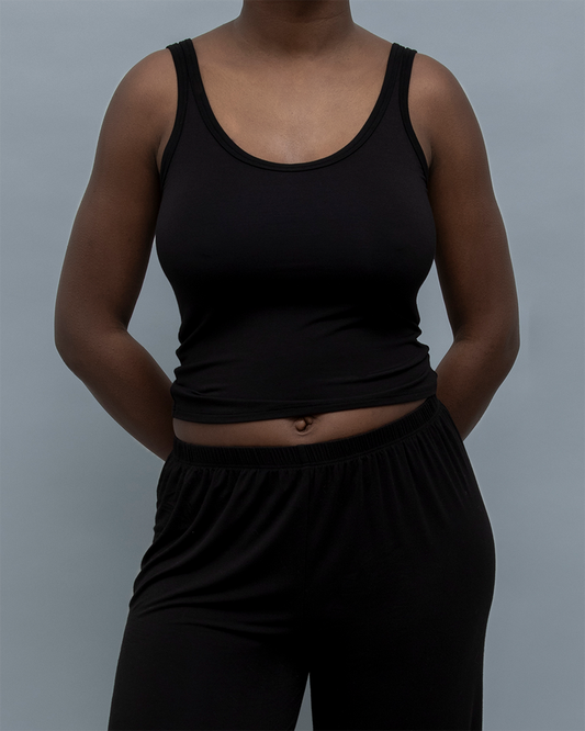 Kye Recline Tank in black, featuring a bamboo scoop neck, sleeveless design, and a form-fitting look. Kye Intimates’ essential for stylish comfort.